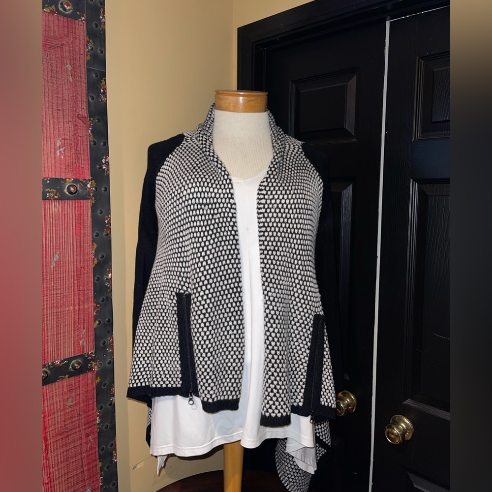 Colour works. Small cardigan. Long sleeve.